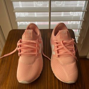 New Balance shoes in perfect condition . I wore them for less than 30 minutes.